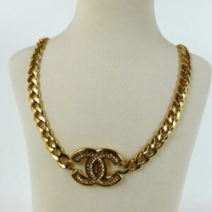 Accueil 1 Collier Chanel CC en Métal Doré